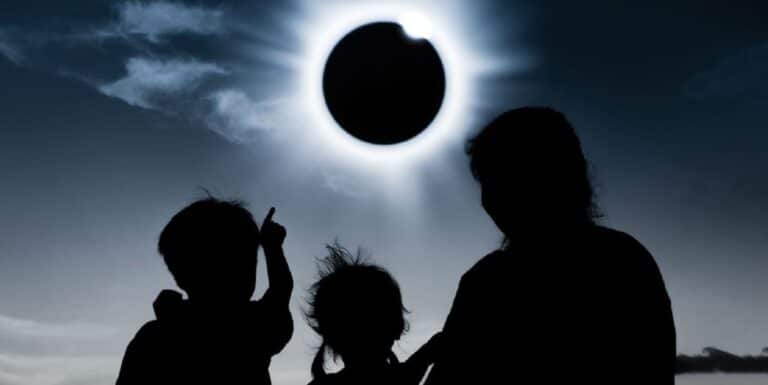 Family watching eclipse