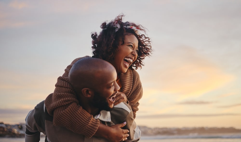 Black couple enjoying time together during their honeymoon and romantic getaways in North Carolina