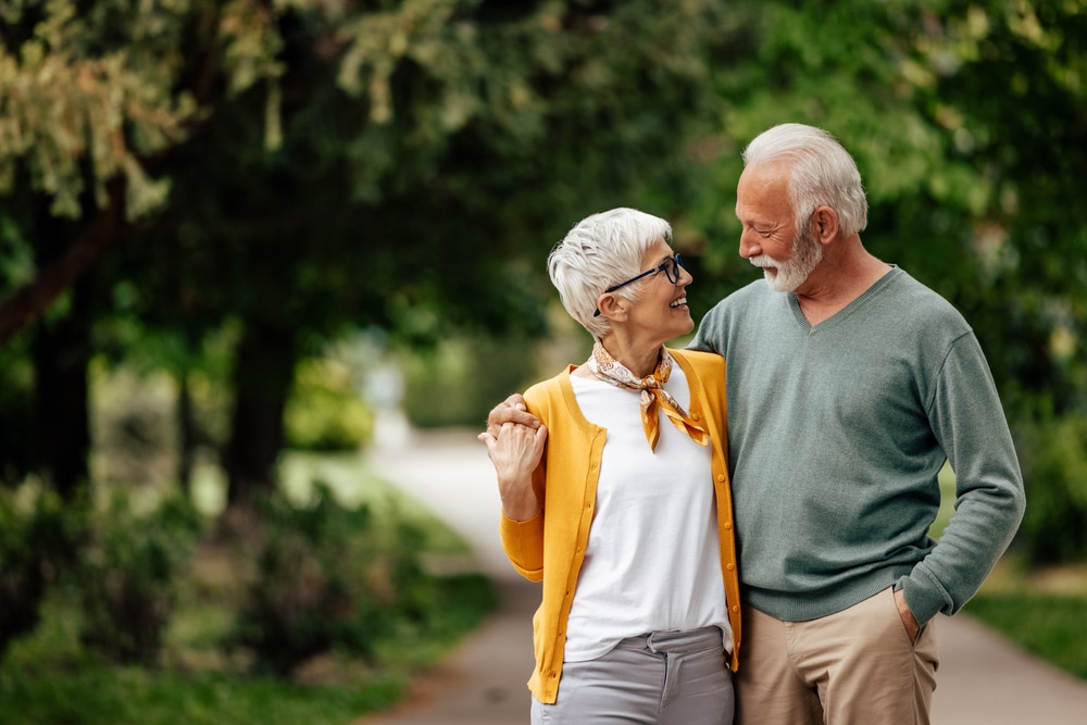 Couple enjoy a walk during their romantic getaway from Charlotte to Durham, NC