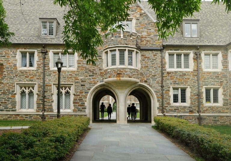 Walking through the arches on the Duke Campus, one of the best things to do in Durham, MC